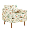 Poltrona in tessuto floreale con gambe in legno